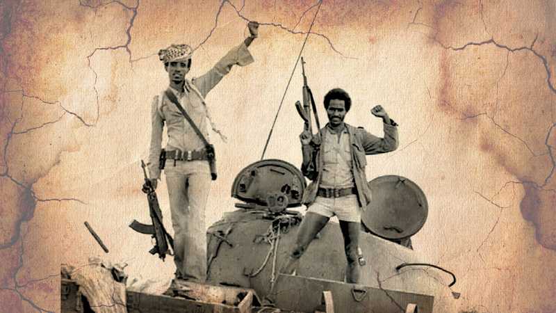 E.P.L.F. fighters aboard a captured tank outside the Nadew Command Center
