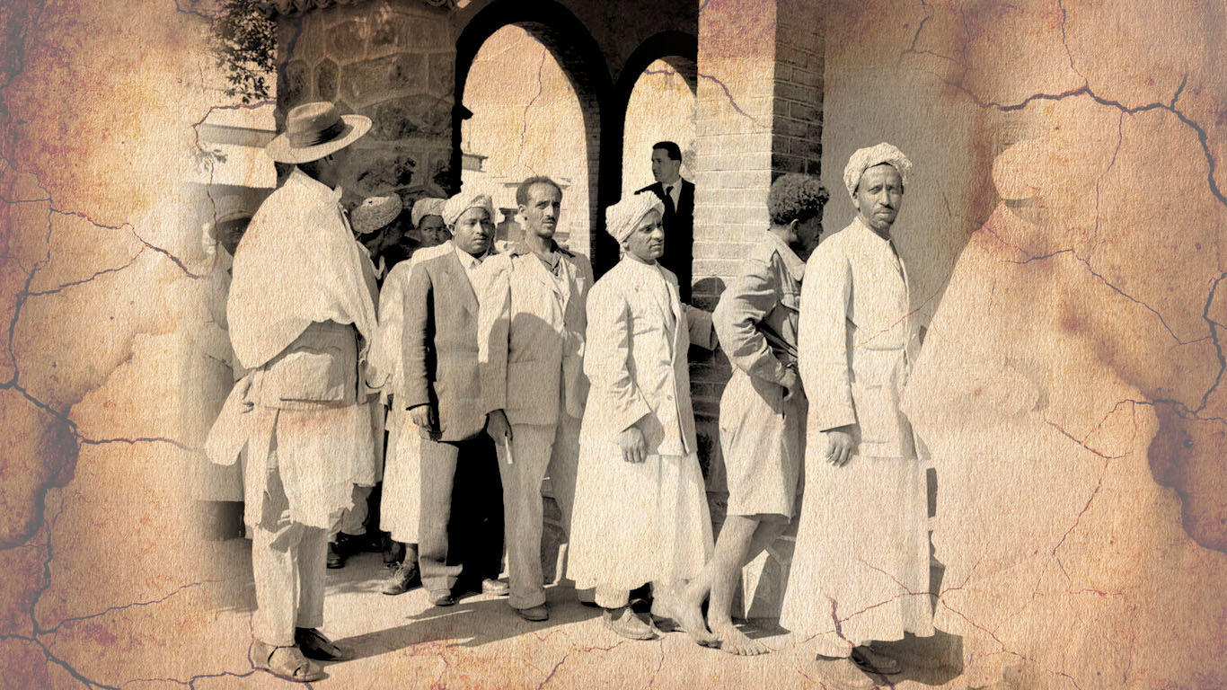 Residents of Mercato Constituency of Asmara patiently wait for their turn outside the polling center)
