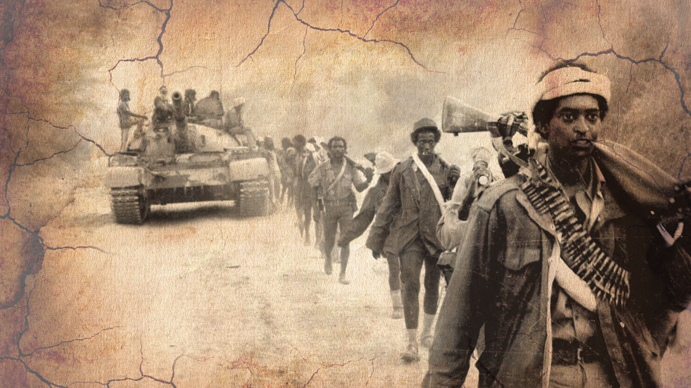 EPLF freedom fighters on the march with a tank unit